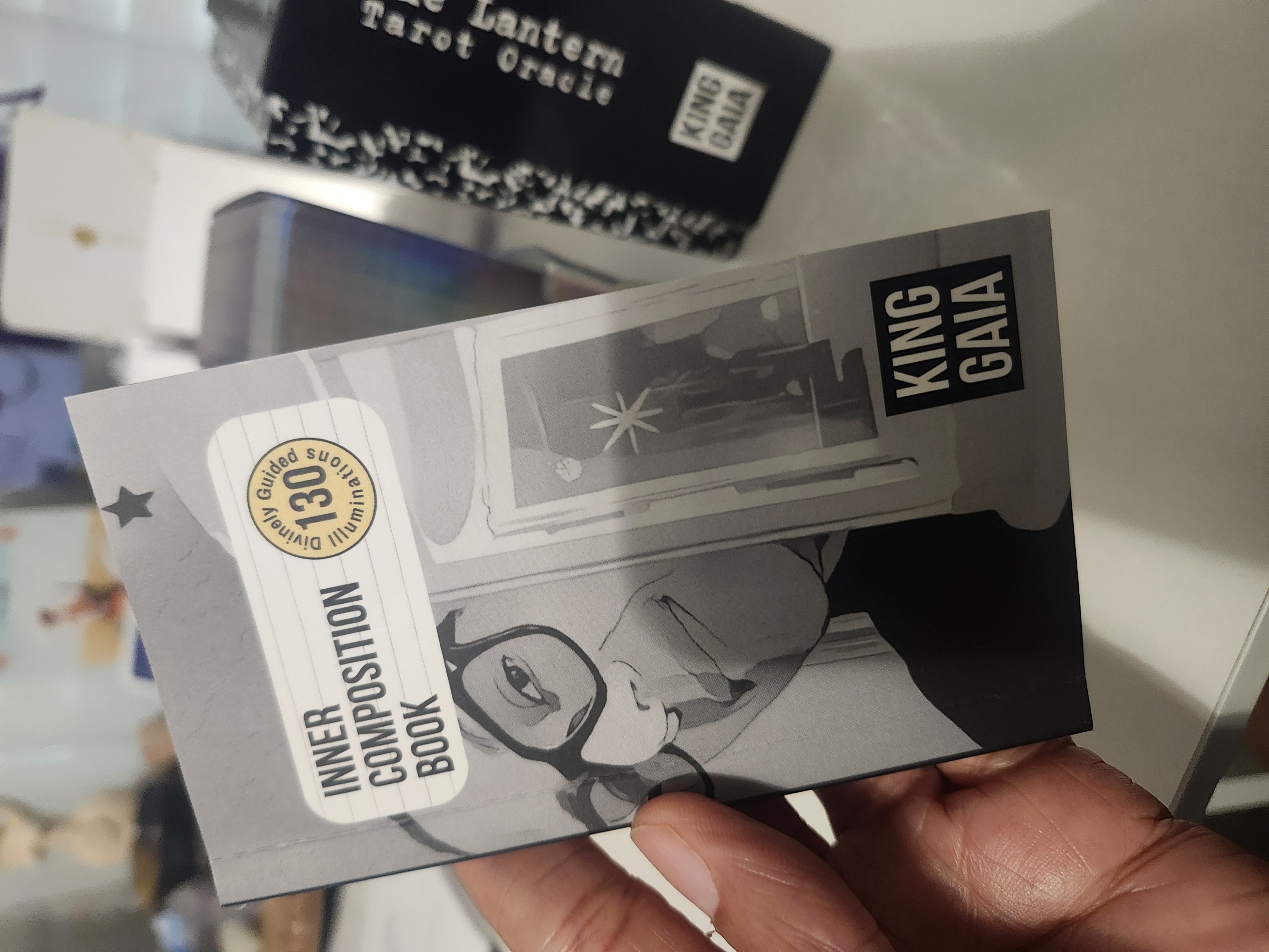 Close-up of the Inner Composition Book and The Lantern Tarot Oracle by King Gaia – part of the Journey Within Illuminations collection for shadow work, self-discovery, and energetic clarity.